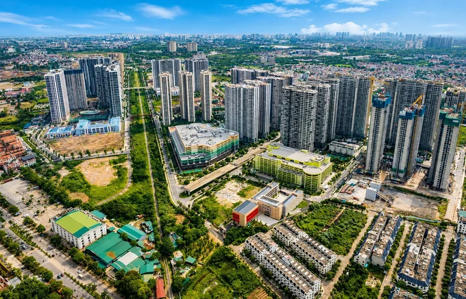 Toàn cảnh khu đô thị với các tòa nhà cao tầng, minh họa thị trường bất động sản và giá trị đất đai